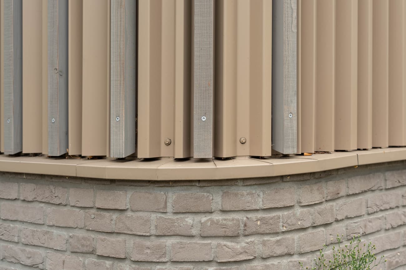 Architectural project - beige facade, rhythmic pattern, metal cladding, industrial facade, brick wall, ribbed cladding, exterior architecture, rustic brick, rhythmic facade, masonry wall, industrial design, steel, metal, modular design, neutral tones, beige, light and shadow, architectural facade, exterior wall, facade detail, contemporary design, light brown, urban design, construction detail, modern facade, stone, brick, brick base, sustainable material, textured facade, urban architecture, vertical cladding, facade texture, modern exterior, exterior cladding, eco facade