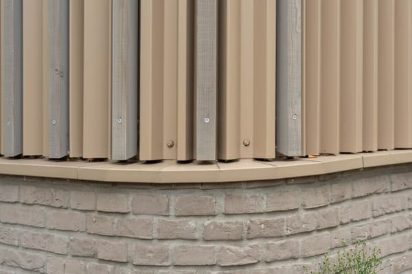Architectural project - beige facade, rhythmic pattern, metal cladding, industrial facade, brick wall, ribbed cladding, exterior architecture, rustic brick, rhythmic facade, masonry wall, industrial design, steel, metal, modular design, neutral tones, beige, light and shadow, architectural facade, exterior wall, facade detail, contemporary design, light brown, urban design, construction detail, modern facade, stone, brick, brick base, sustainable material, textured facade, urban architecture, vertical cladding, facade texture, modern exterior, exterior cladding, eco facade