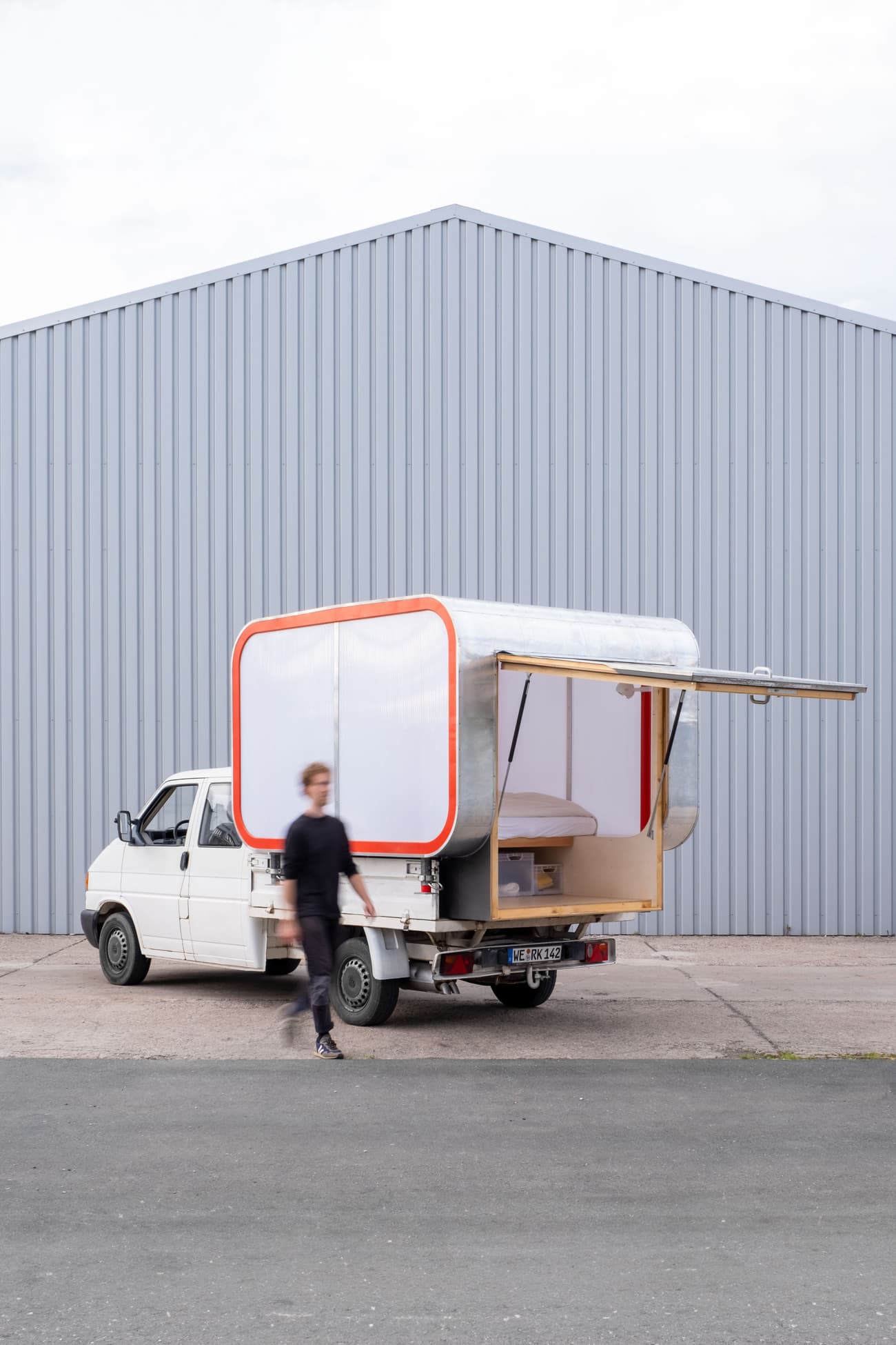 Architectural project - portable dwelling, truck camper, mobile lifestyle, flexible space, mobile home, tiny house, minimalist travel, modern nomad, travel home, transportable home, trailer home, prefab home, minimal architecture, pop-up home, camping vehicle, moveable home, urban nomad, adventure lifestyle, silver, eco-friendly design, wood, steel, metal, outdoor living, glass, modular design, innovative design, functional space, minimalist design, lightweight structure, adaptable space, white, compact design, off-grid living, minimalist aesthetic, sleek design, compact living, simple lines, aluminum, sustainable living, efficient design, red, efficient space