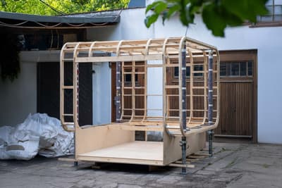 Architectural project - DIY construction, wooden framework, CNC fabrication, off-site construction, skeletal design, outdoor assembly, eco-friendly build, compact structure, structural efficiency, outdoor workshop, urban assembly, simple assembly, flexible structure, workshop vibe, natural materials, wood, timber, temporary structure, outdoor space, timber frame, modular construction, modular design, sustainable construction, industrial aesthetic, innovative design, neutral tones, construction site, lightweight design, outdoor installation, modern construction, assembly process, adaptable design, plywood, light wood, honey wood, minimalist design, open framework, prefabricated structure, natural finish, light tones, sustainable building, eco construction, contemporary build, green design, innovative architecture, construction innovation, structural grid