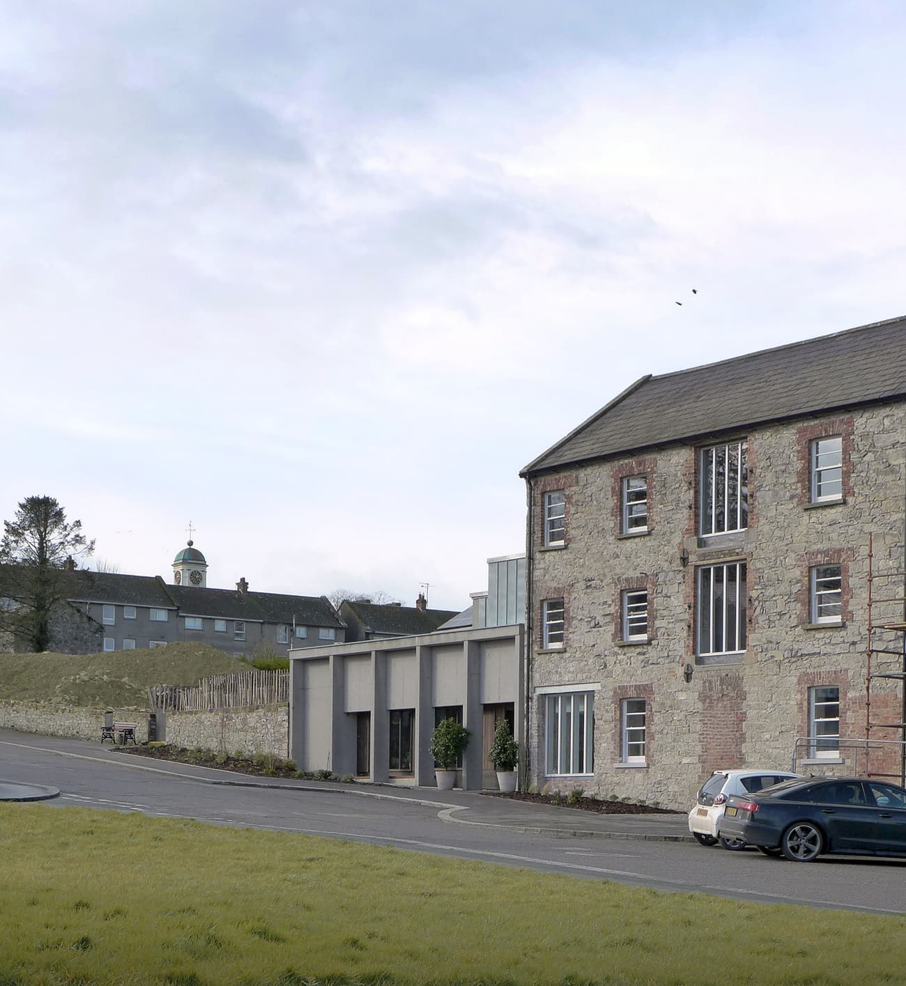 Architectural project - stone facade, heritage preservation, traditional meets modern, modern extension, countryside vibe, contemporary addition, country house, historic building, renovation project, grass lawn, tall windows, eco-friendly design, wood, grey tones, metal, outdoor space, natural light, glass, sustainable architecture, grey, brown, farmhouse style, rustic vibe, vernacular architecture, rustic charm, industrial touch, neutral palette, adaptive reuse, natural landscape, large windows, bright exterior, stone, earthy tones, countryside architecture, traditional design, brick, rural setting, brick facade, heritage building, cozy exterior, rustic exterior, residential building, sustainable renovation, architectural contrast, rural retreat, mixed materials, inviting facade, brick texture, stone texture