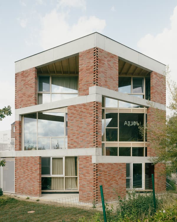 Architectural project - rhythmic pattern, urban dwelling, airy structure, brick exterior, open windows, concrete frame, grey concrete, warm brick, city home, multi-level, urban house, natural materials, natural light, passive design, sustainable design, glass, green building, exposed structure, grey, daylight, beige, concrete, low carbon design, daylight optimization, eco friendly, natural textures, contemporary design, neutral palette, minimalist design, modern facade, clean lines, modern architecture, outdoor view, energy efficient, brick, red brick, garden view, family home, residential building, glass facade, cubic shape, urban living, red