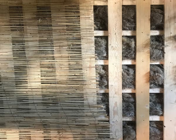 Architectural project - straw, wall detail, rustic elements, sustainable insulation, bamboo screen, bamboo weaving, natural fibers, bamboo, life cycle design, resource-efficient design, natural materials, wood, timber, raw materials, warm tones, eco design, sustainable construction, green building, exposed structure, sustainable architecture, neutral tones, beige, brown, low carbon design, timber construction, rustic vibe, natural textures, eco-friendly construction, wood structure, sustainable building, biophilic design, passive house, energy efficient design, timber cladding, wood cladding, organic materials, natural wall, eco architecture, earthy textures, timber wall, straw insulation, natural insulation